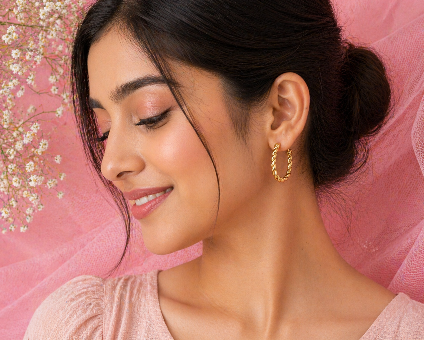 Twisted Gold Oval Hoop Earrings
